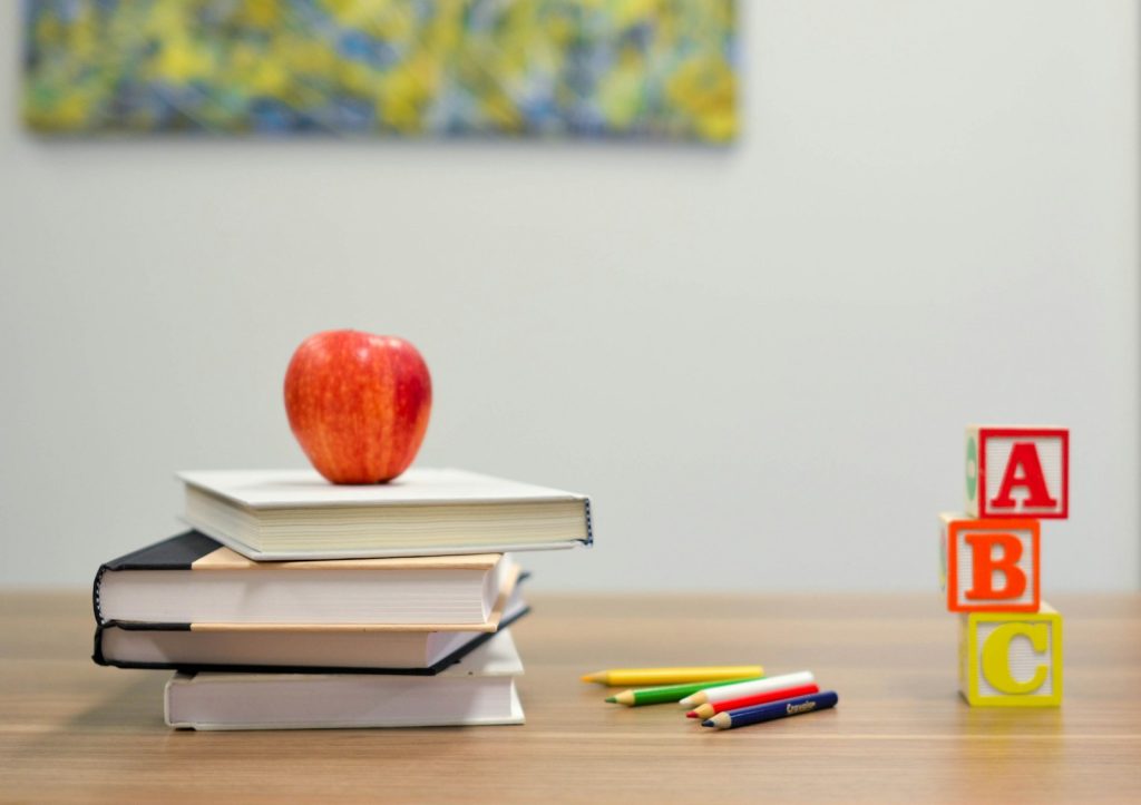 School supplies laid out on a table for a back-to-school giveaway